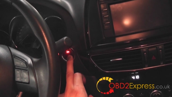 press button and turn red indictor 600x338 - How to make key for Mazda 6 2013 using OBDSTAR F-100 - How to make key for Mazda 6 2013 using OBDSTAR F-100
